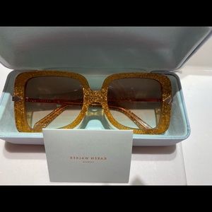 Stylish Karen Walker sunglasses.  Worn once for an hour.